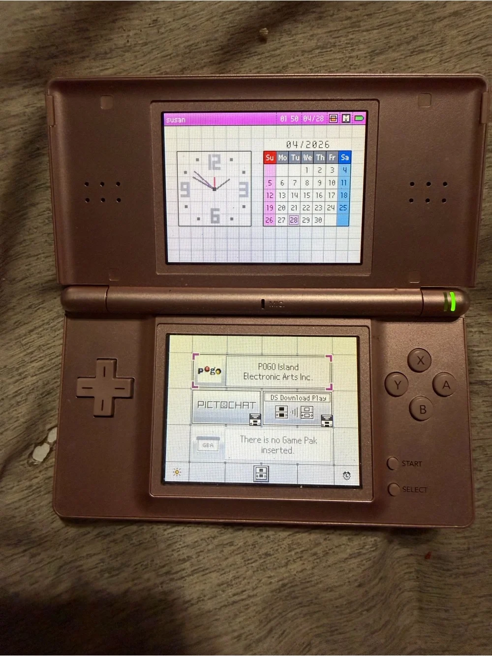 Nintendo DS Rose Pink Handheld Console with Stylus and Games, and charge cord